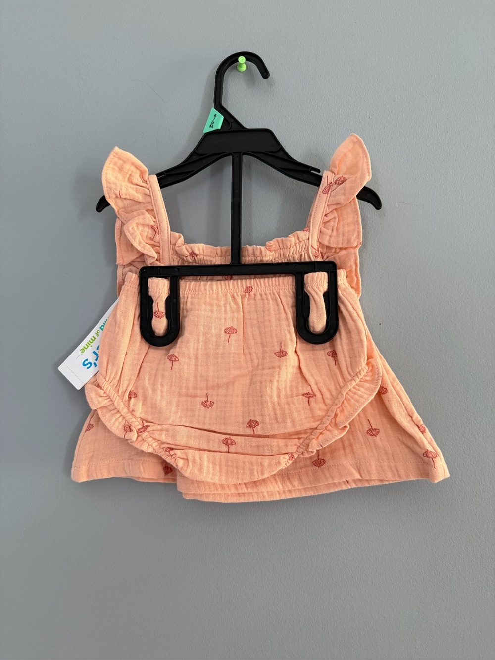 Soft Peach Ruffled Baby Tank Top with ruffle bottom